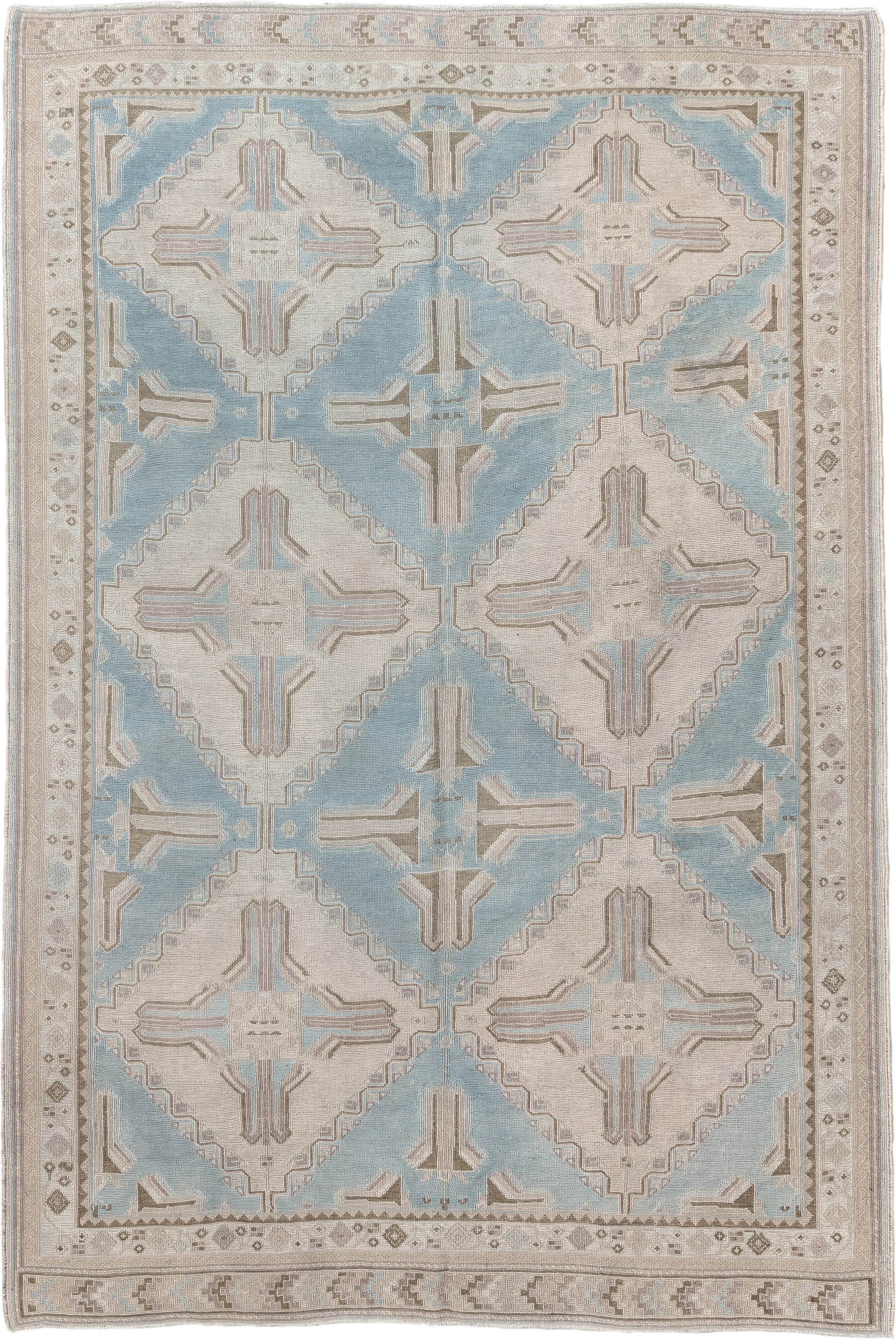 5' x 7' one-of-a-kind handmade antique Sumak rug. Color palette: ivory, light blue, taupe, beige, camel, gray