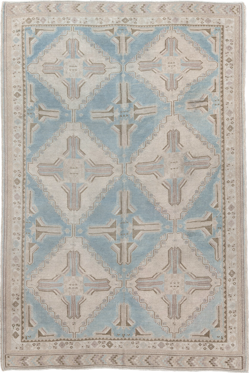 5' x 7' one-of-a-kind handmade antique Sumak rug. Color palette: ivory, light blue, taupe, beige, camel, gray