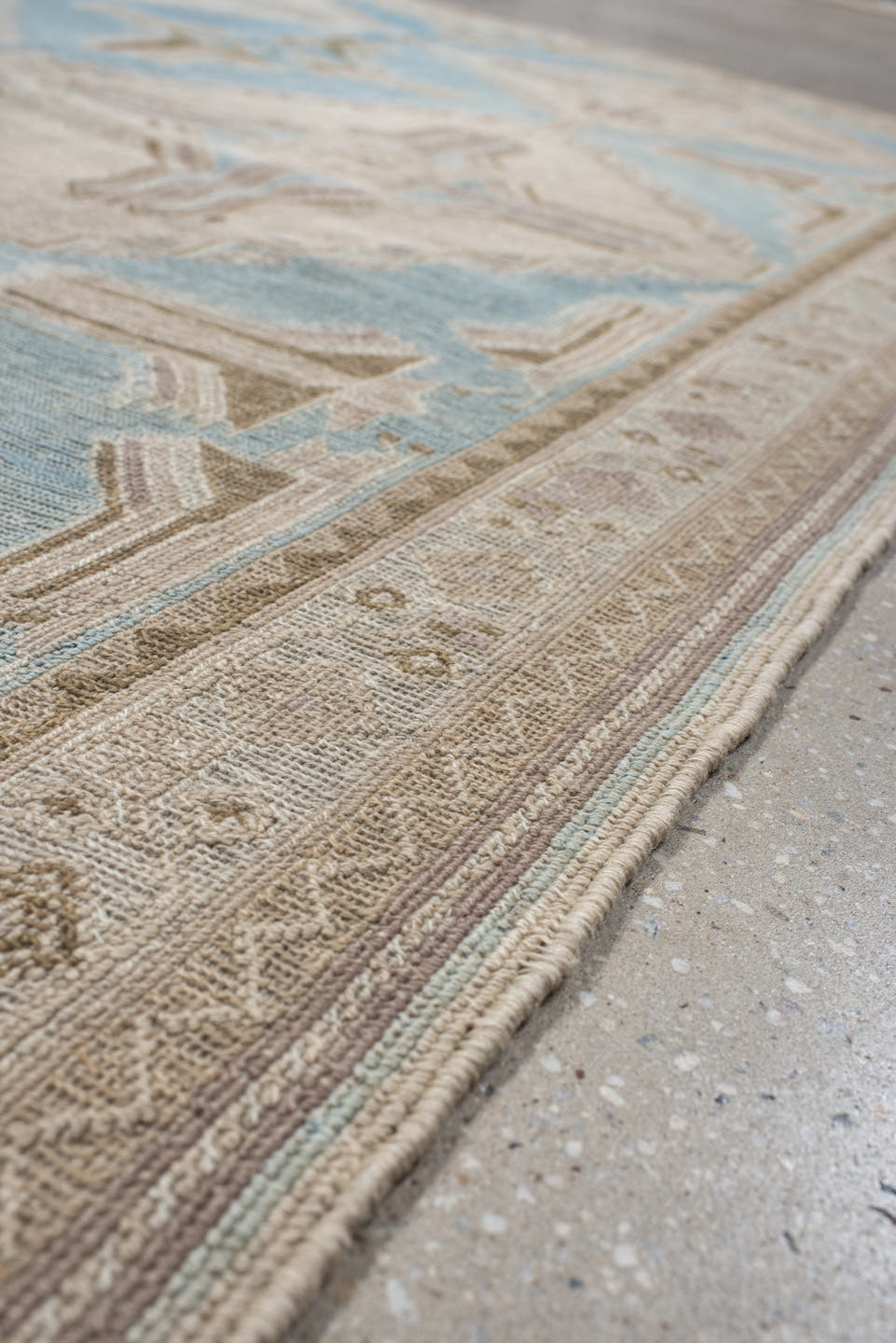 5' x 7' one-of-a-kind handmade antique Sumak rug. Color palette: ivory, light blue, taupe, beige, camel, gray
