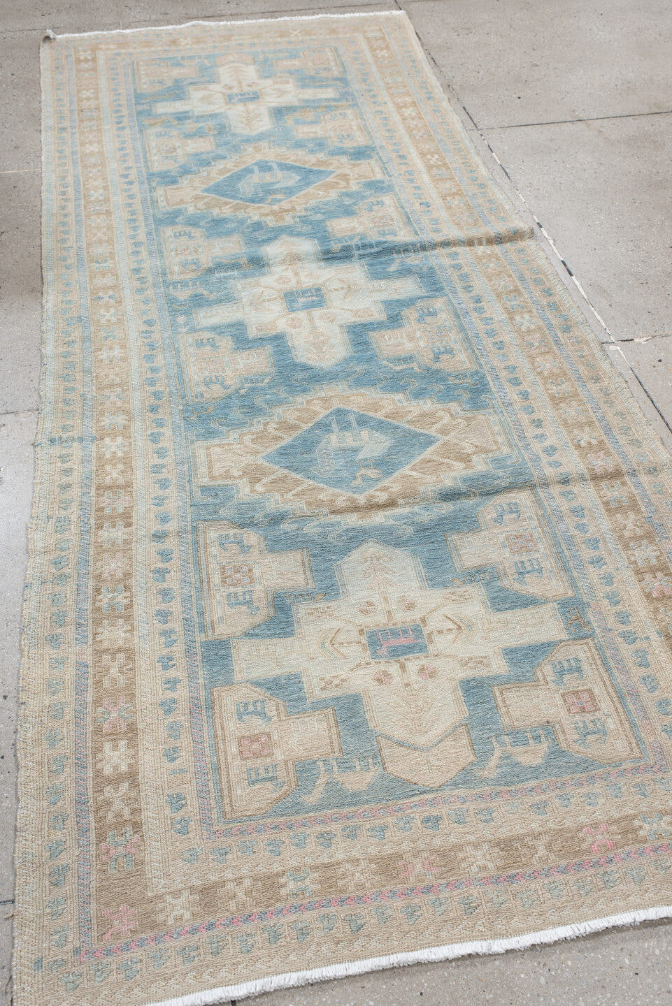 3' x 9' one-of-a-kind handmade vintage Sumak runner rug. Color palette: powder blue, ivory, taupe, beige, sand, pale brown