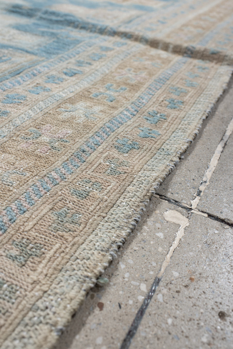 3' x 9' one-of-a-kind handmade vintage Sumak runner rug. Color palette: powder blue, ivory, taupe, beige, sand, pale brown