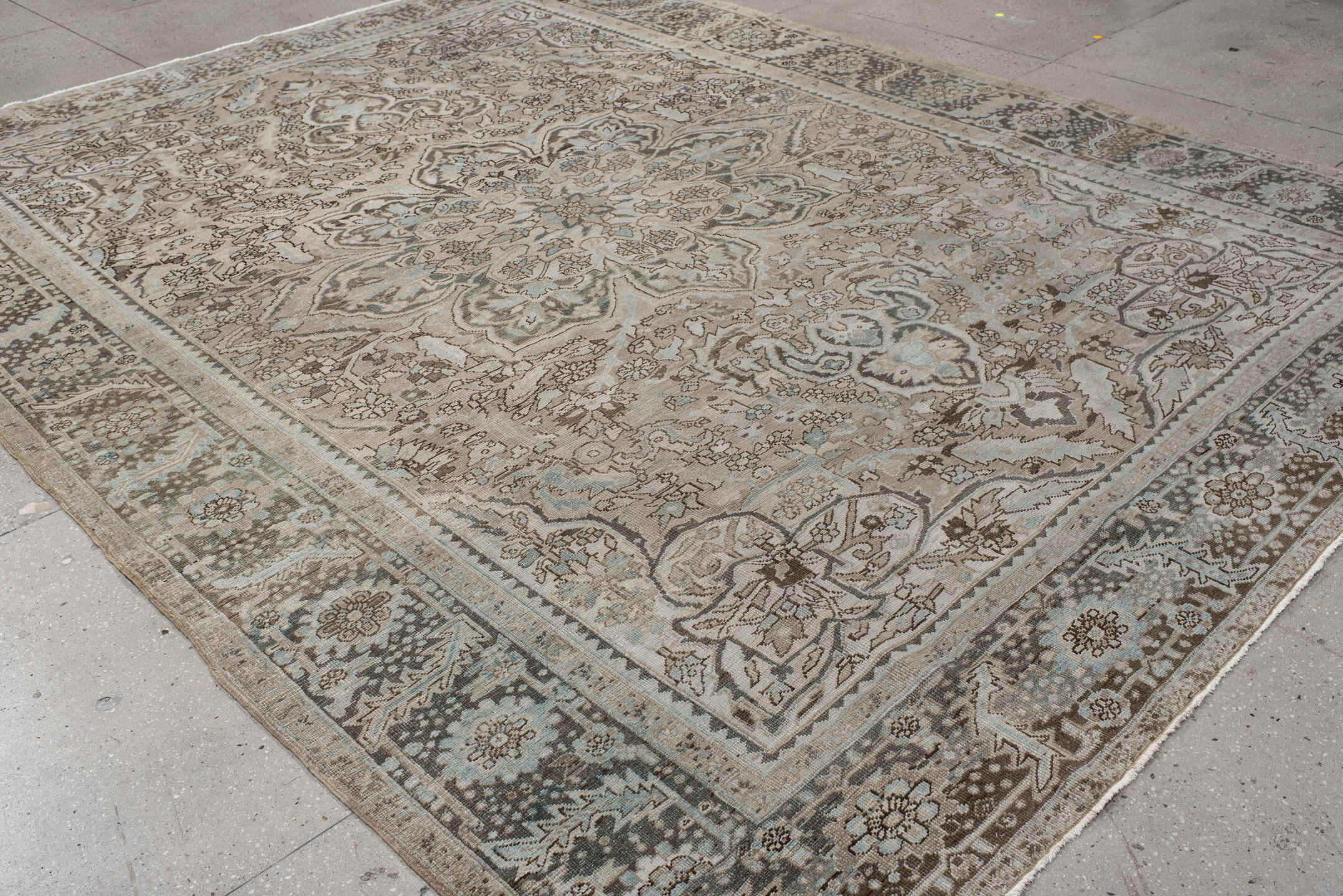 9' x 12' one-of-a-kind handmade antique Heriz large size rug. Color palette: taupe, brown, ivory, pale_blue, charcoal, beige