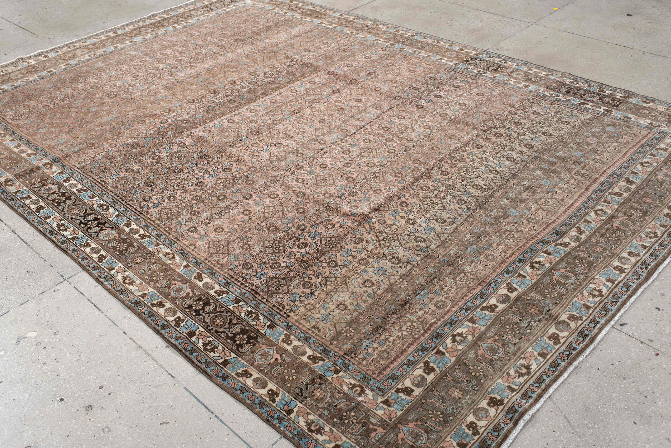 7' x 10' one-of-a-kind handmade vintage Bidjar large size rug. Color palette: rose, taupe, brown, ivory, light blue