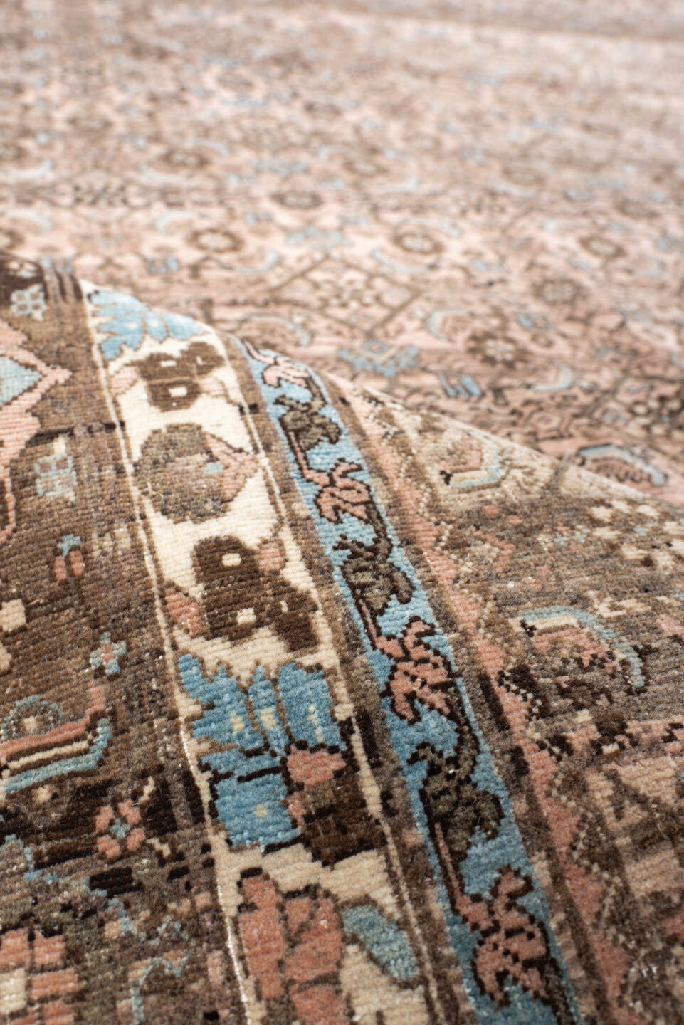 7' x 10' one-of-a-kind handmade vintage Bidjar large size rug. Color palette: rose, taupe, brown, ivory, light blue