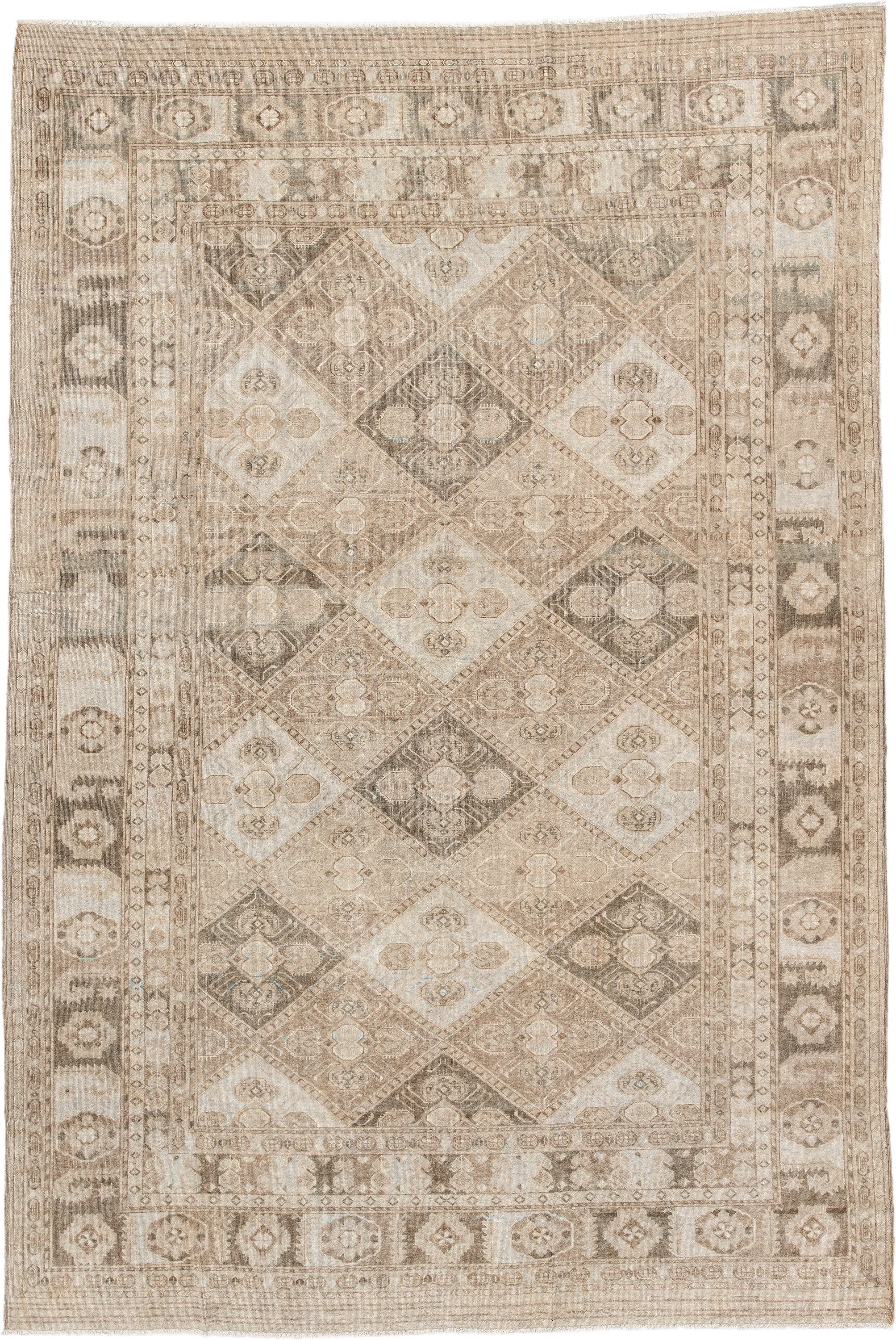 6' x 9' one-of-a-kind handmade antique Afghan medium size rug. Color palette: ivory, taupe, camel, beige, brown, sand