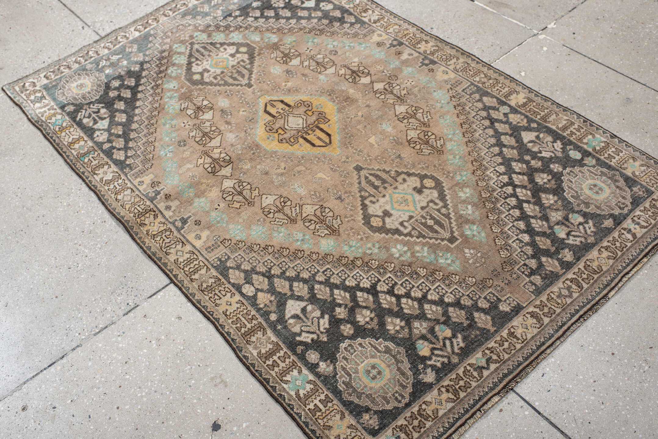 3' x 5' one-of-a-kind handmade vintage Shiraz small size rug. Color palette: taupe, charcoal, ivory, brown, turquoise, cream