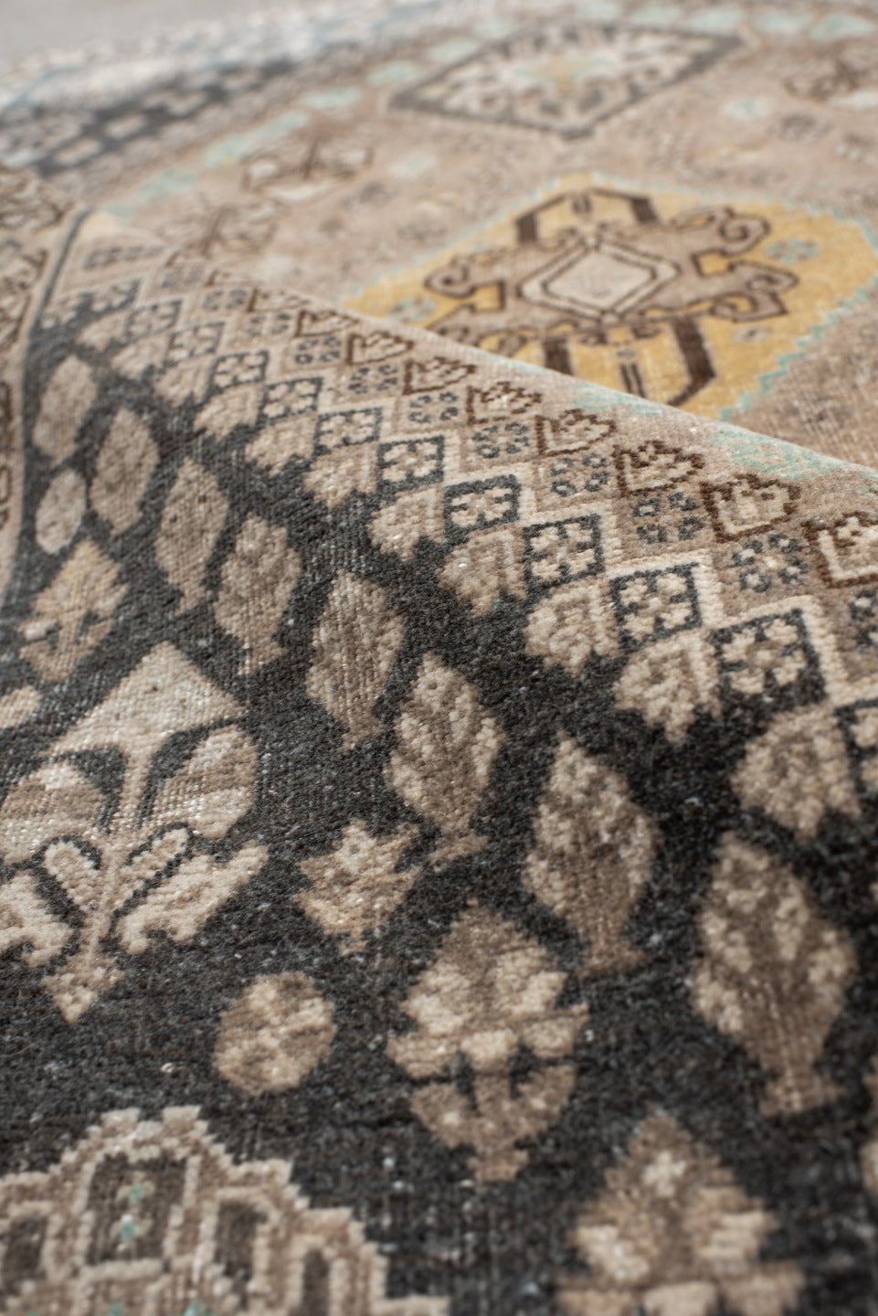 3' x 5' one-of-a-kind handmade vintage Shiraz small size rug. Color palette: taupe, charcoal, ivory, brown, turquoise, cream