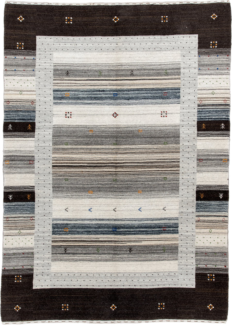 5' x 7' one-of-a-kind handmade vintage Gabbe rug. Color palette: charcoal, ivory, gray, slate, cream, gold, red, green