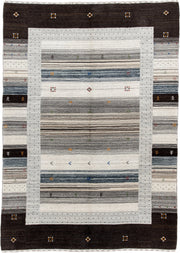 5' x 7' one-of-a-kind handmade vintage Gabbe rug. Color palette: charcoal, ivory, gray, slate, cream, gold, red, green