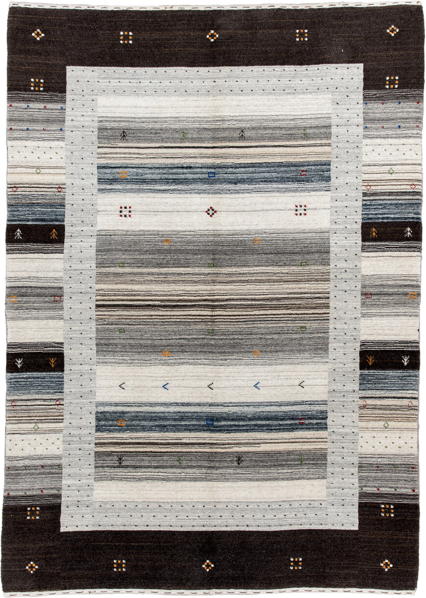 5' x 7' one-of-a-kind handmade vintage Gabbe rug. Color palette: charcoal, ivory, gray, slate, cream, gold, red, green