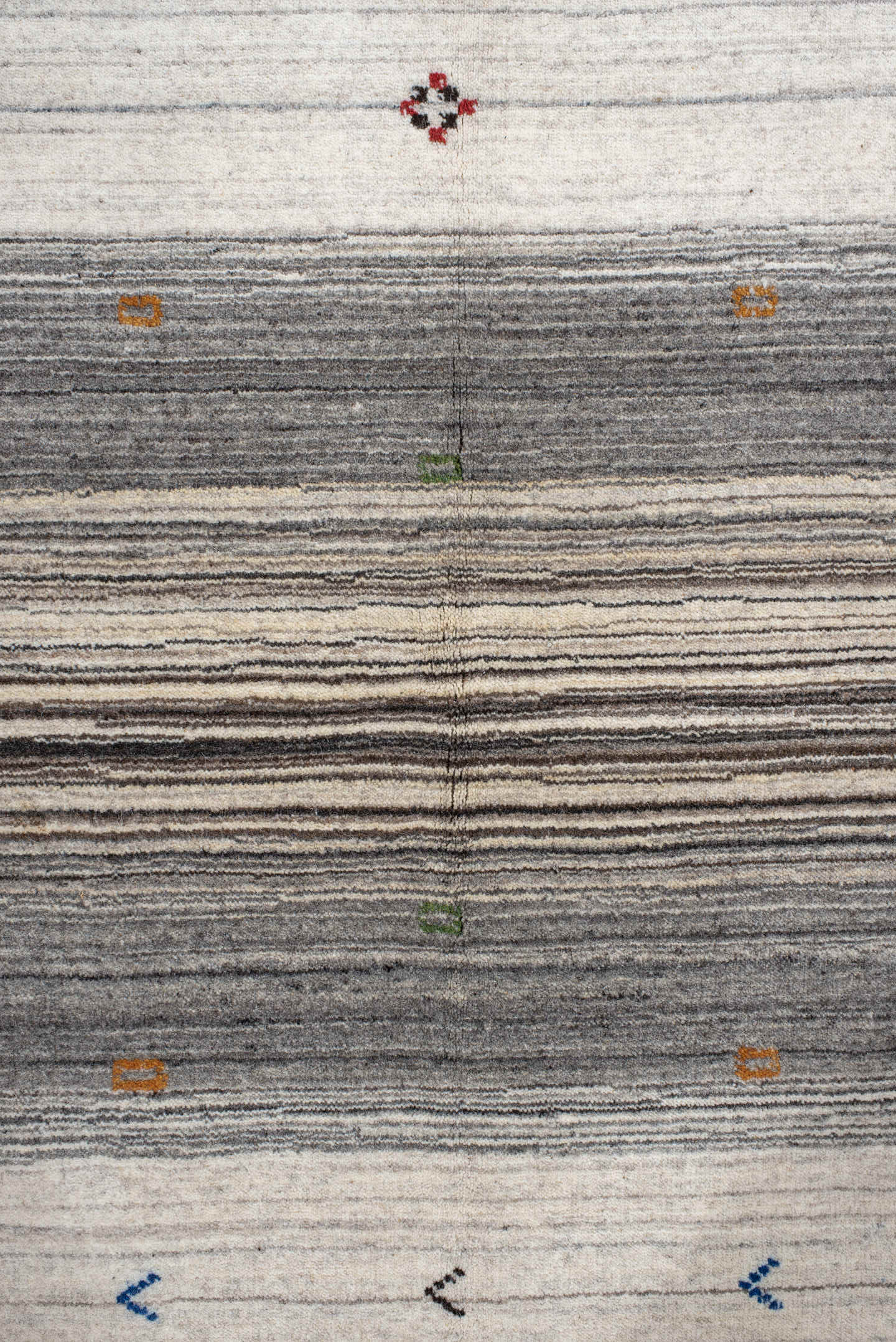 5' x 7' one-of-a-kind handmade vintage Gabbe rug. Color palette: charcoal, ivory, gray, slate, cream, gold, red, green