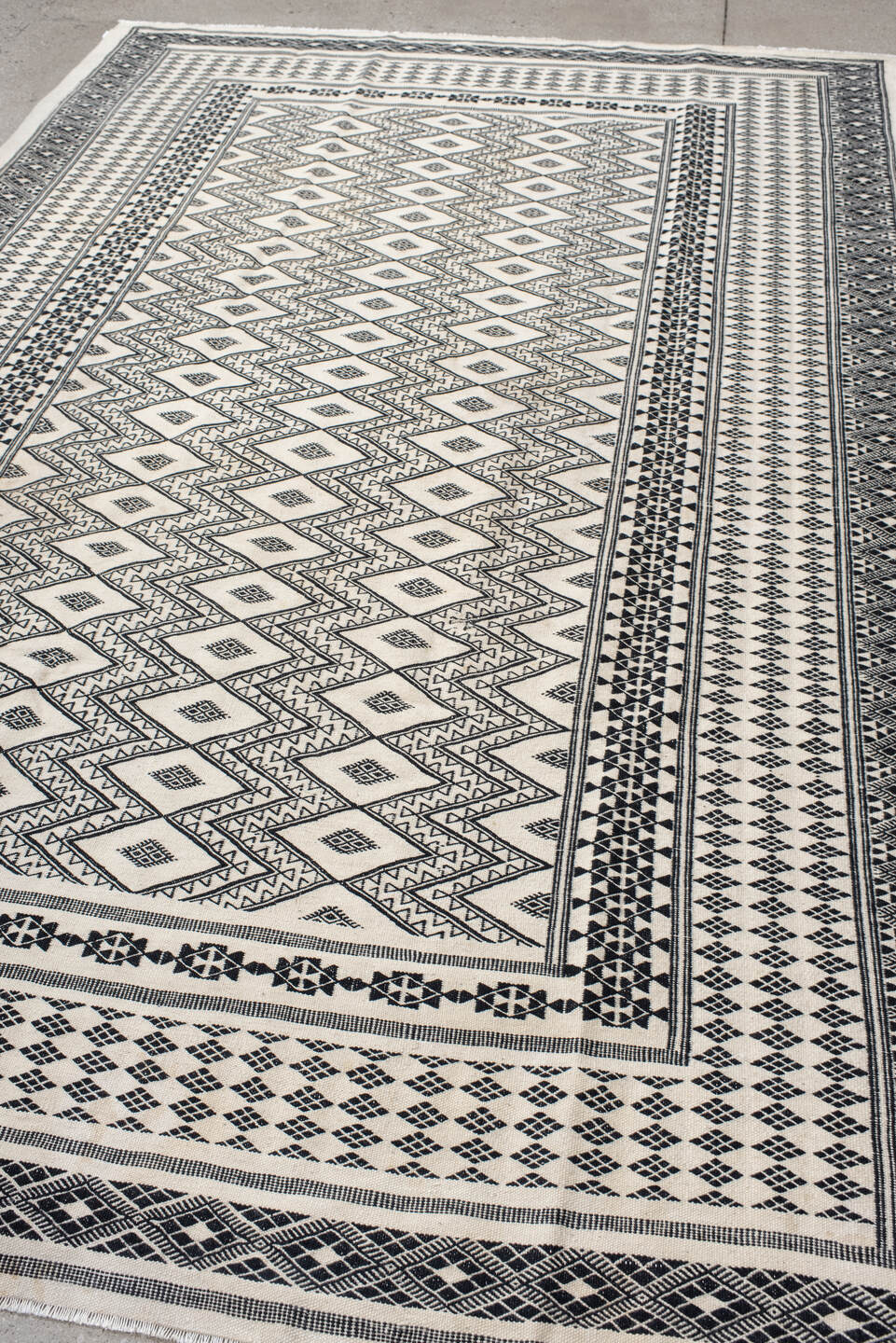7' x 10' one-of-a-kind handmade vintage Kilim large size rug. Color palette: ivory, charcoal, black, gray