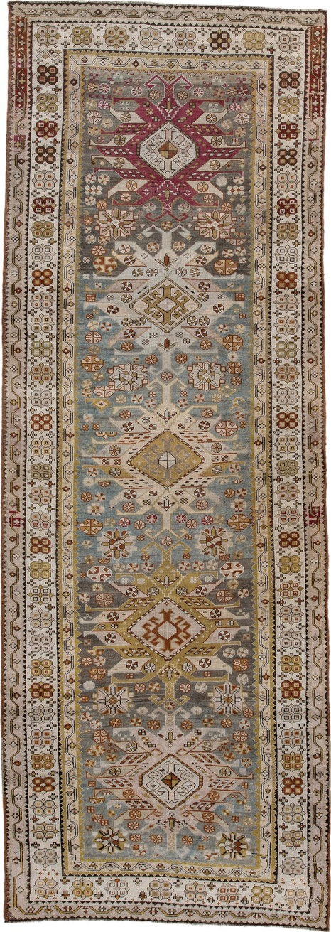 3' x 10' one-of-a-kind handmade antique Caucasian runner rug. Color palette: ivory, pale blue, taupe, rose, rust, gold, sage