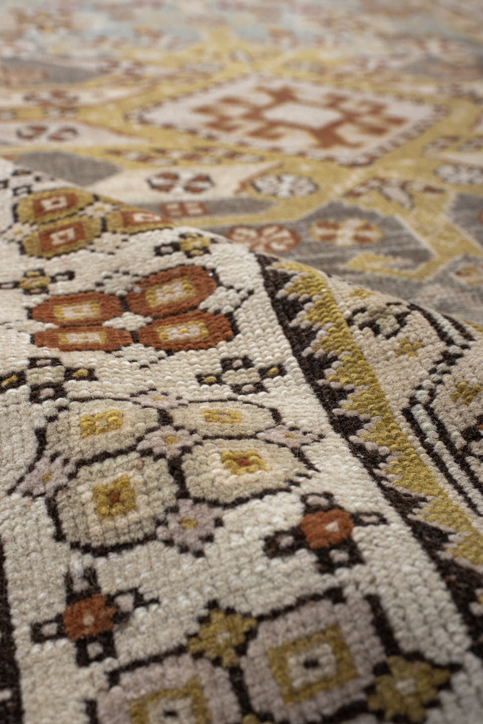 3' x 10' one-of-a-kind handmade antique Caucasian runner rug. Color palette: ivory, pale blue, taupe, rose, rust, gold, sage