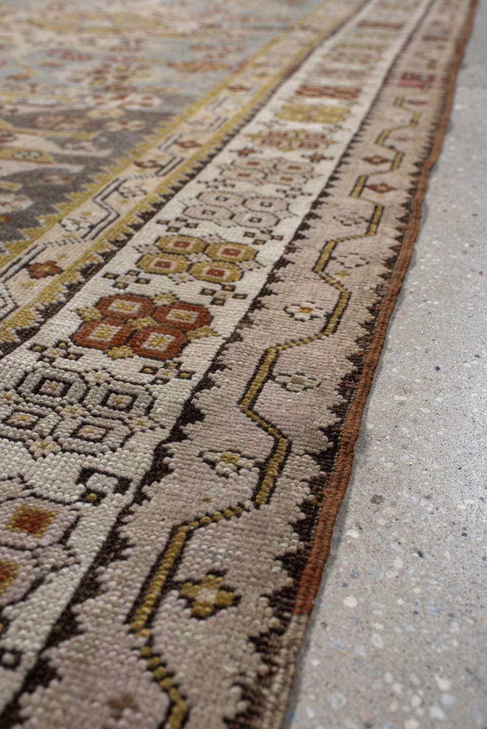 3' x 10' one-of-a-kind handmade antique Caucasian runner rug. Color palette: ivory, pale blue, taupe, rose, rust, gold, sage