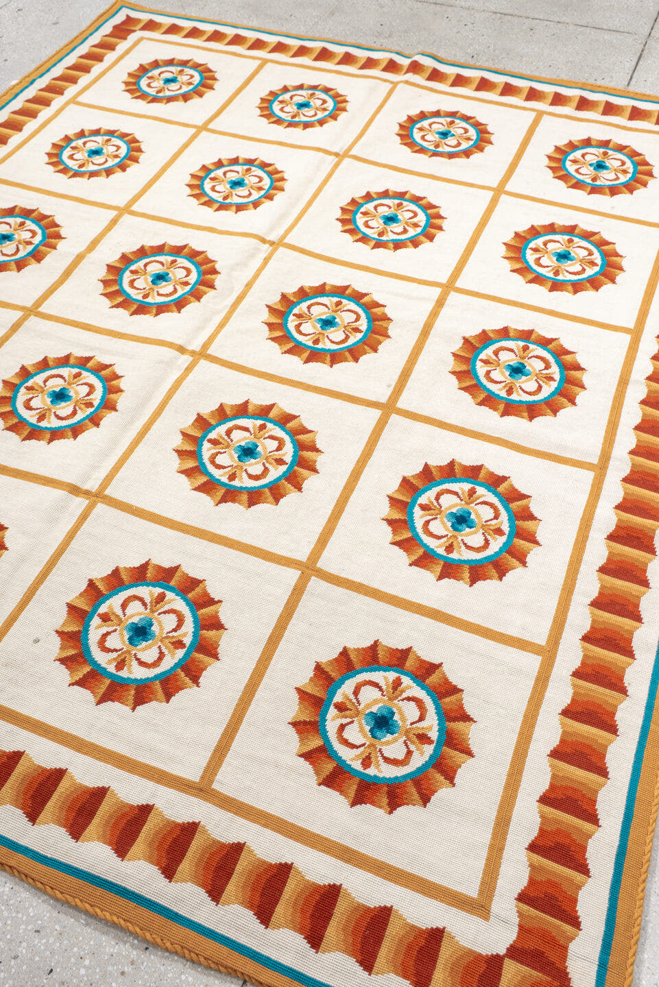 6' x 7' one-of-a-kind handmade antique Needlepoint rug. Color palette: ivory, rust, peach, turquoise, camel, terracotta