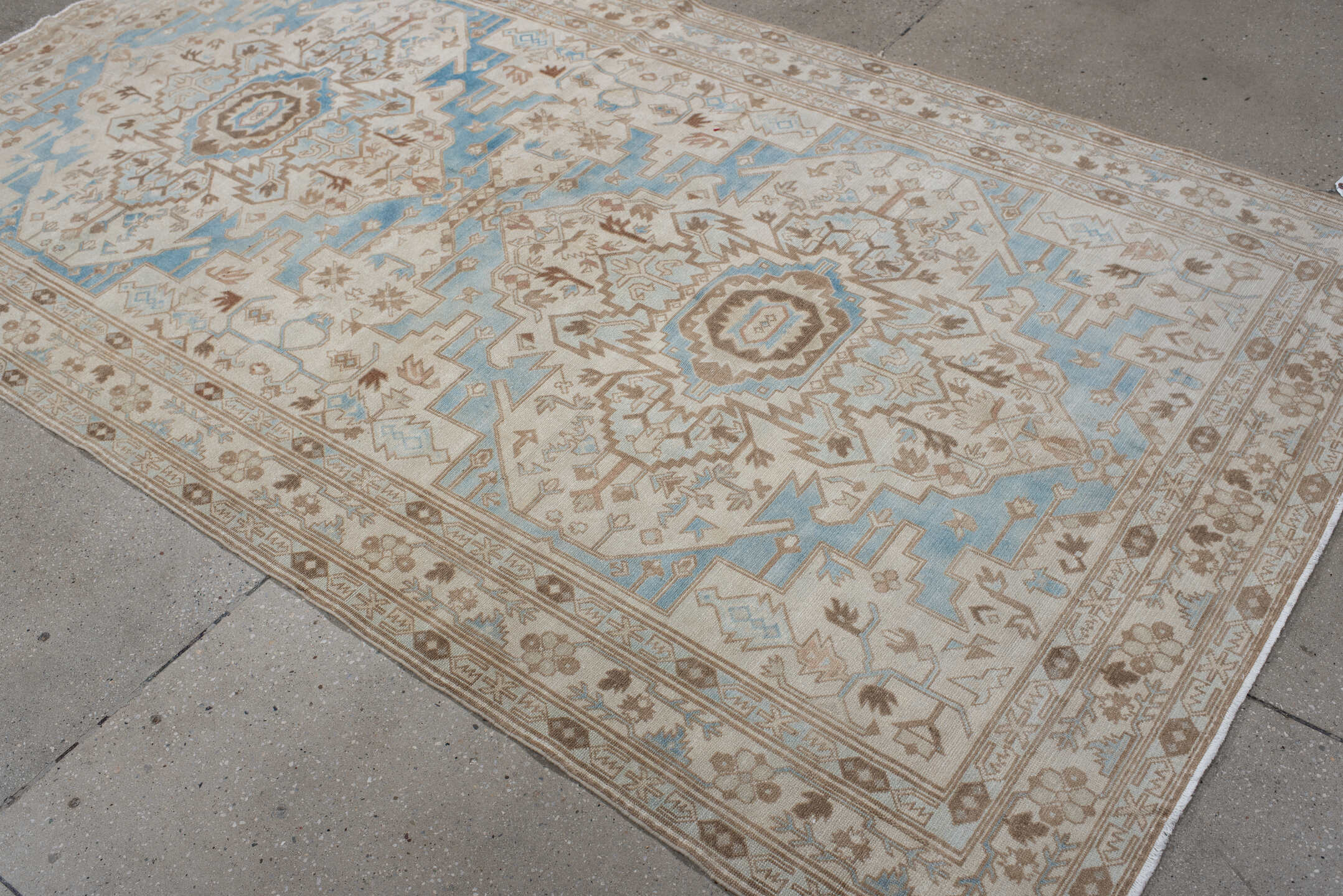 4' x 8' one-of-a-kind handmade antique Sivas rug. Color palette: ivory, sky_blue, taupe, camel, beige, light_blue