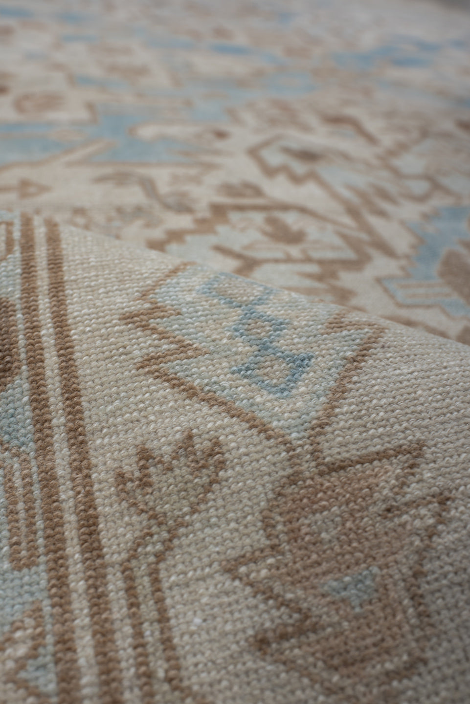 4' x 8' one-of-a-kind handmade vintage Sivas rug. Color palette: gray, light gray, off-white, blue, brown, pink, silver