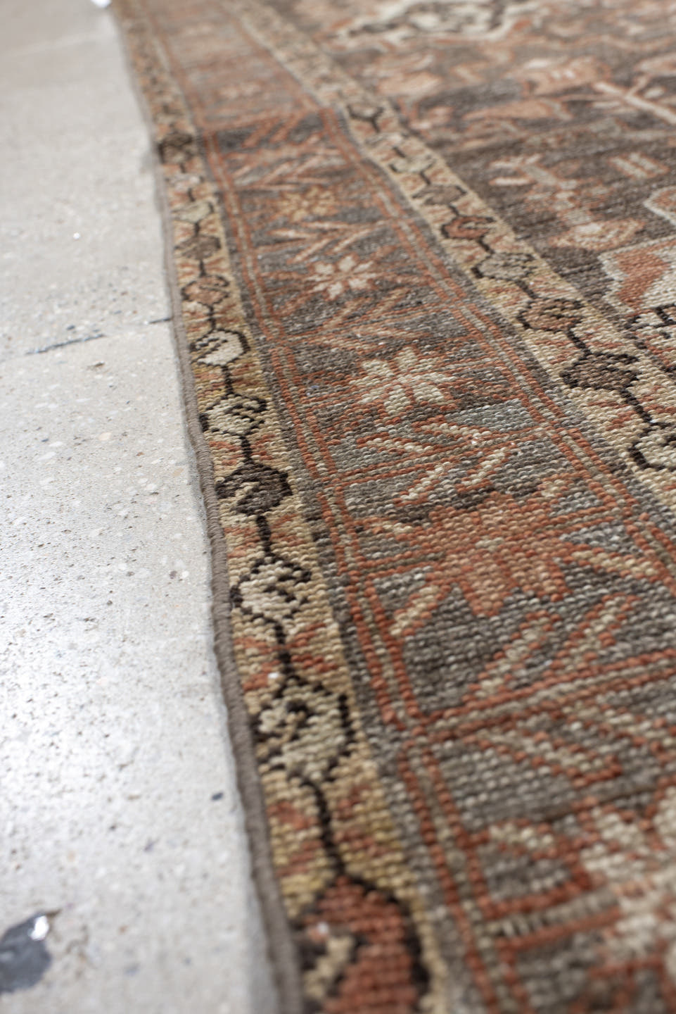 4' x 7' one-of-a-kind handmade vintage Baktiary rug. Color palette: taupe, terra cotta, ivory, slate, camel, charcoal, rose