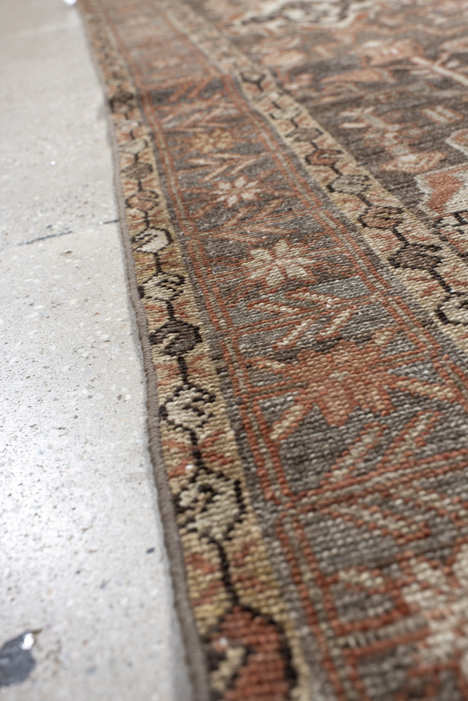 4' x 7' one-of-a-kind handmade vintage Baktiary rug. Color palette: taupe, terra cotta, ivory, slate, camel, charcoal, rose