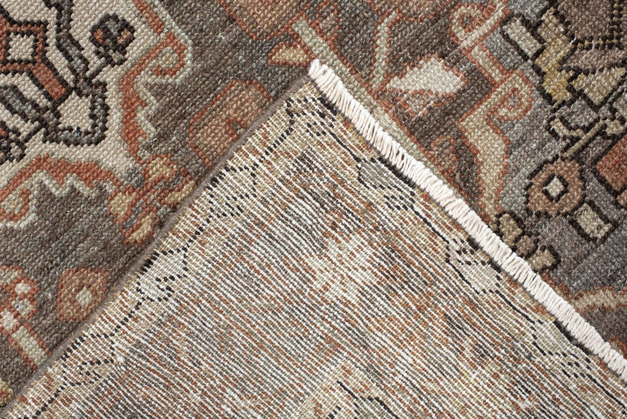 4' x 7' one-of-a-kind handmade vintage Baktiary rug. Color palette: taupe, terra cotta, ivory, slate, camel, charcoal, rose