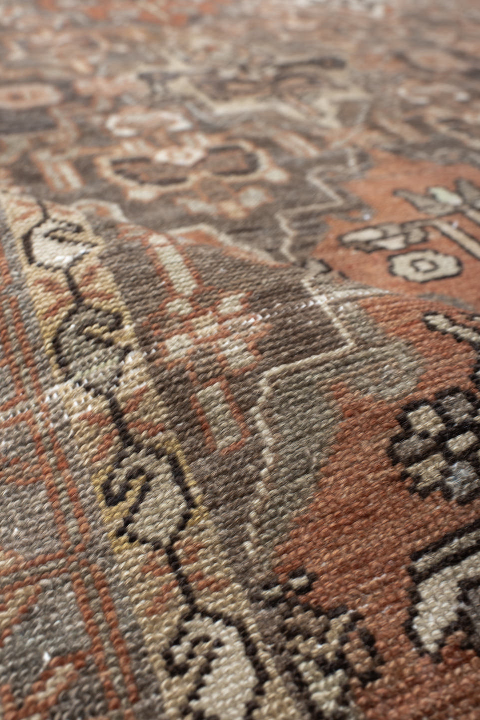 4' x 7' one-of-a-kind handmade vintage Baktiary rug. Color palette: taupe, terra cotta, ivory, slate, camel, charcoal, rose