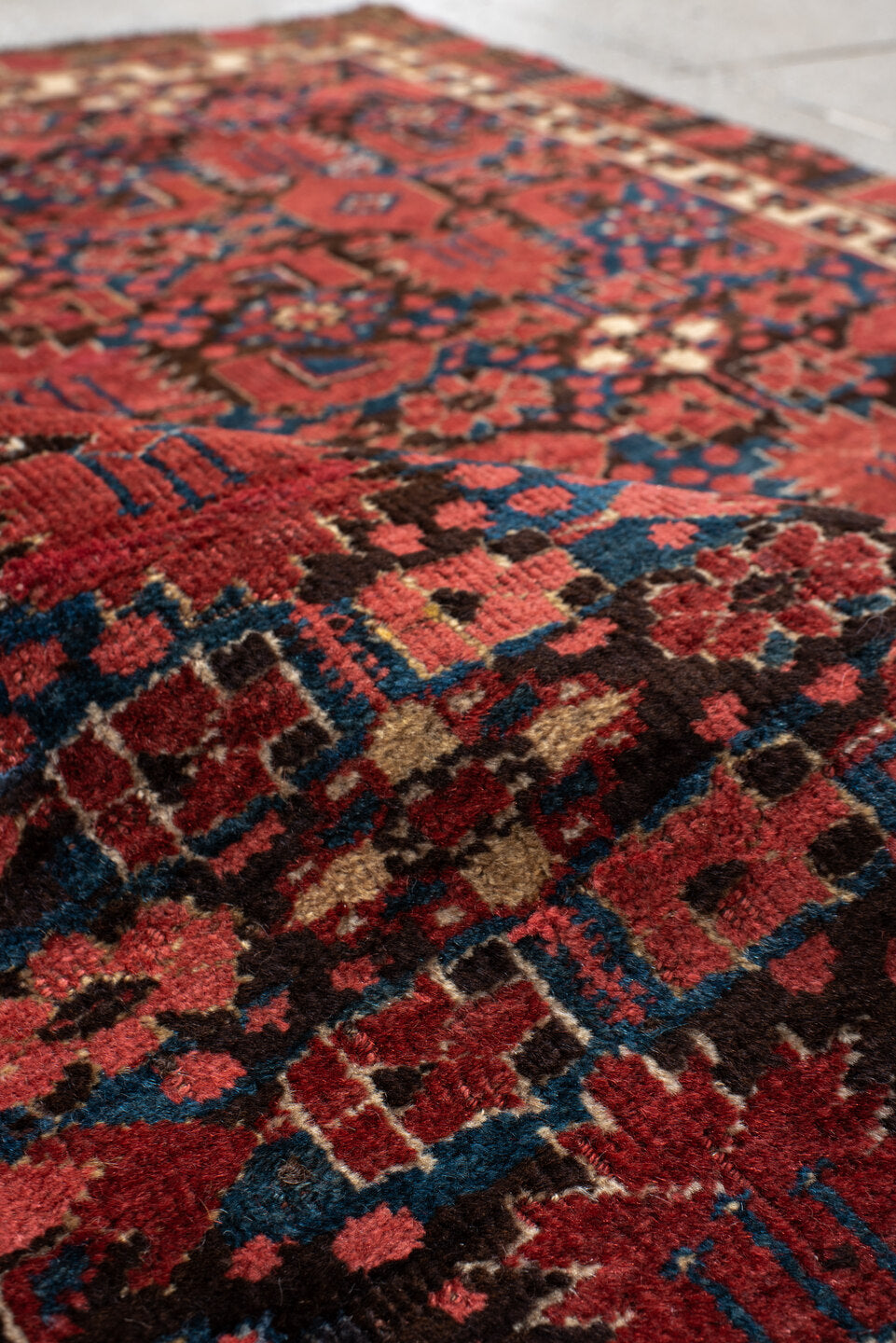 4' x 5' one-of-a-kind handmade vintage Beshir small size rug. Color palette: bisque, black, blue, brown, gray, off-white