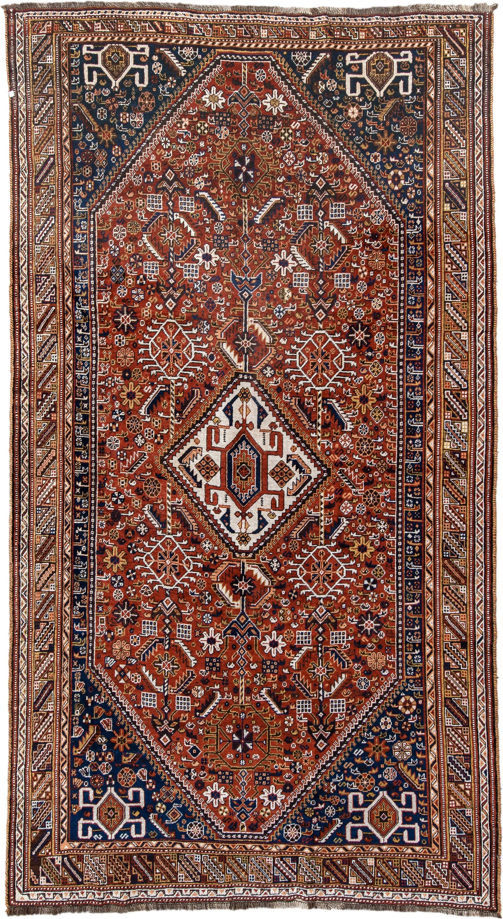 6' x 11' one-of-a-kind handmade antique Qashqai large size rug. Color palette: rust, navy, ivory, terracotta, camel