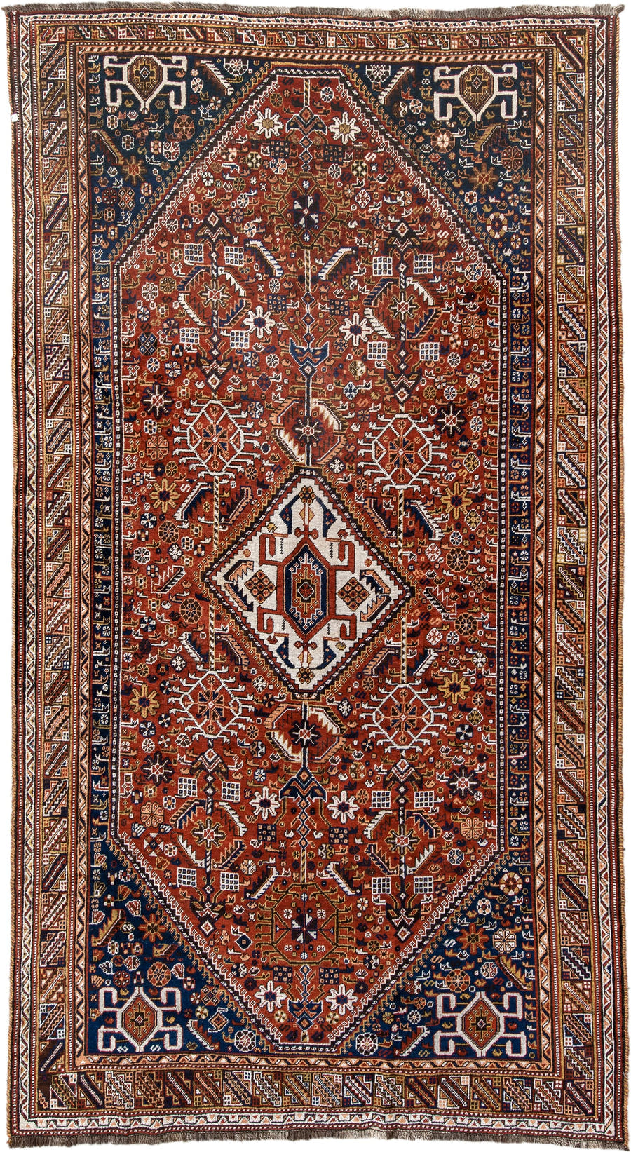 6' x 11' one-of-a-kind handmade antique Qashqai large size rug. Color palette: rust, navy, ivory, terracotta, camel