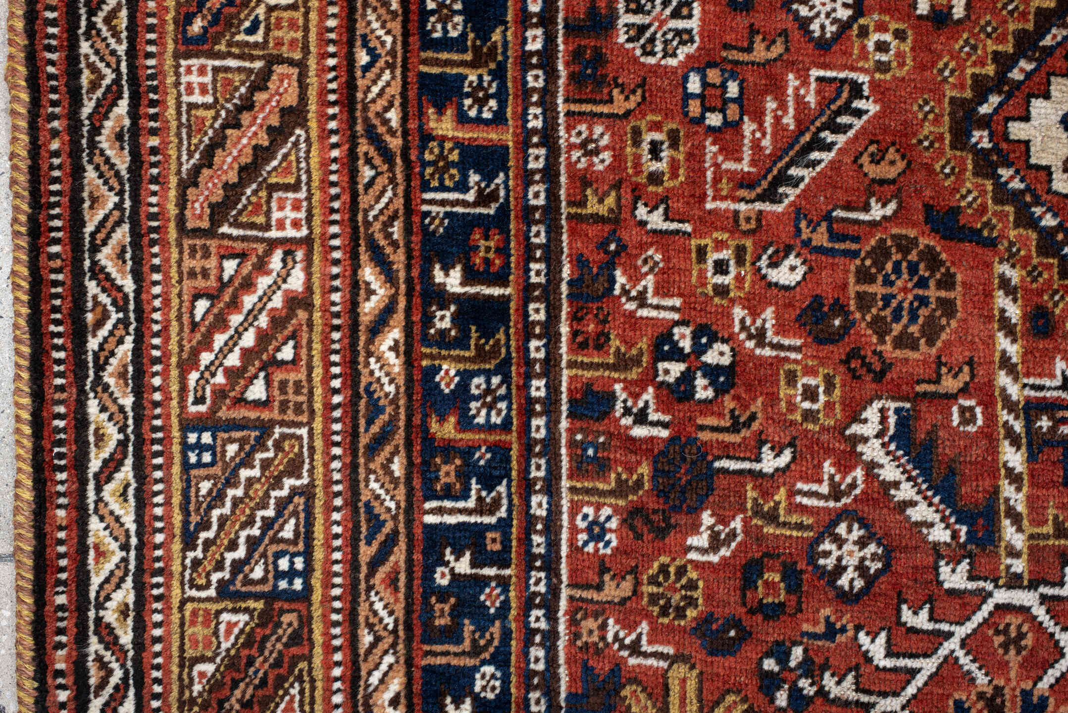 6' x 11' one-of-a-kind handmade antique Qashqai large size rug. Color palette: rust, navy, ivory, terracotta, camel