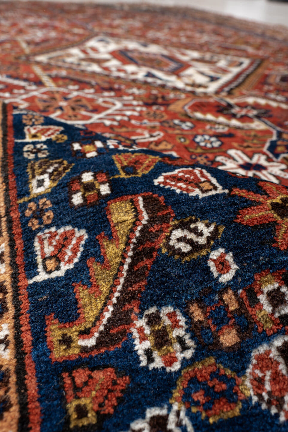 6' x 11' one-of-a-kind handmade antique Qashqai large size rug. Color palette: rust, navy, ivory, terracotta, camel