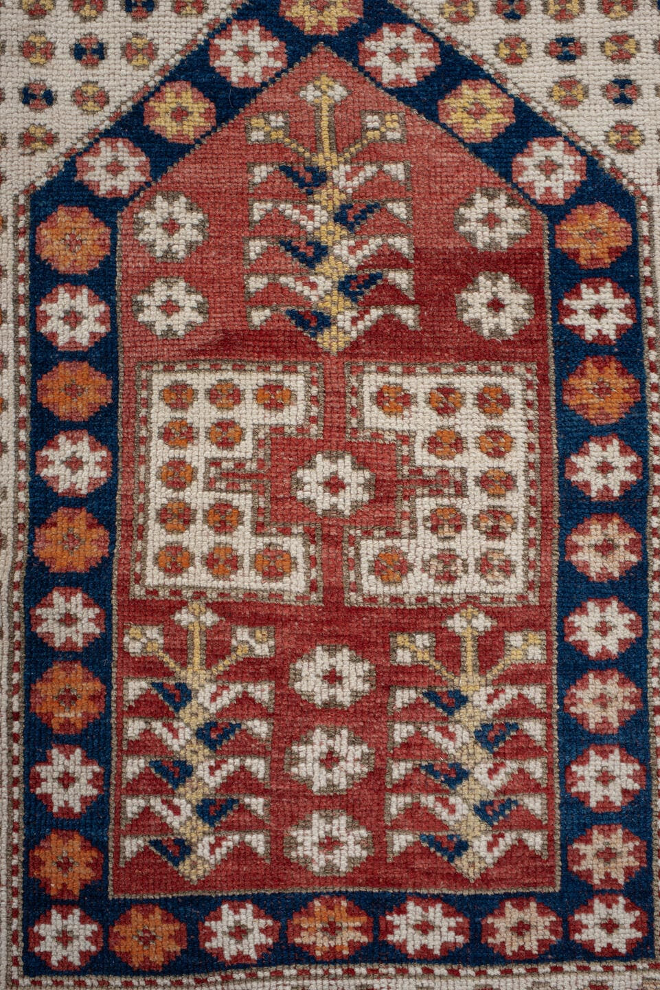 3' x 4' one-of-a-kind handmade antique Anatolian small size rug. Color palette: terracotta, ivory, indigo, rust, gold, camel