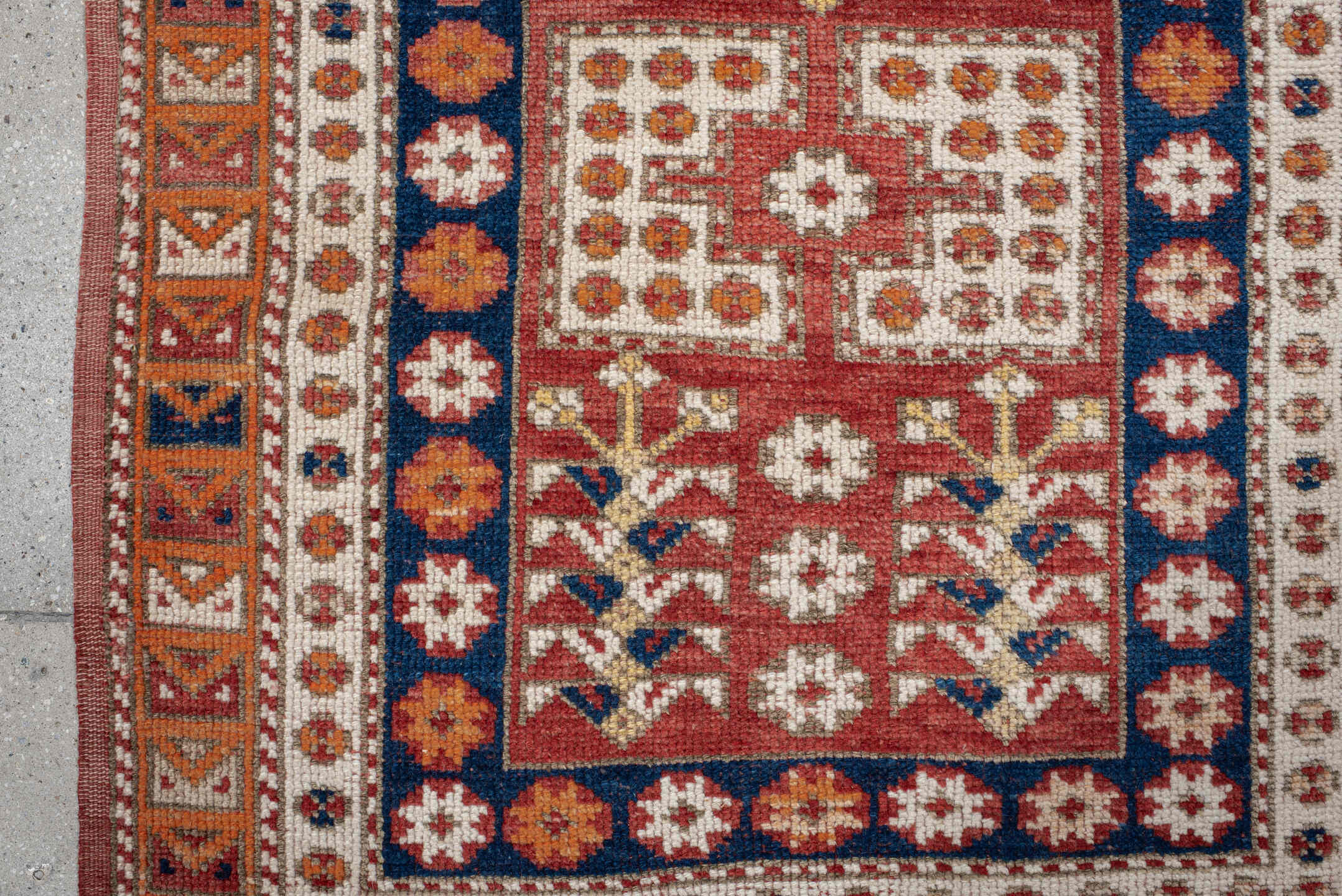 3' x 4' one-of-a-kind handmade antique Anatolian small size rug. Color palette: terracotta, ivory, indigo, rust, gold, camel