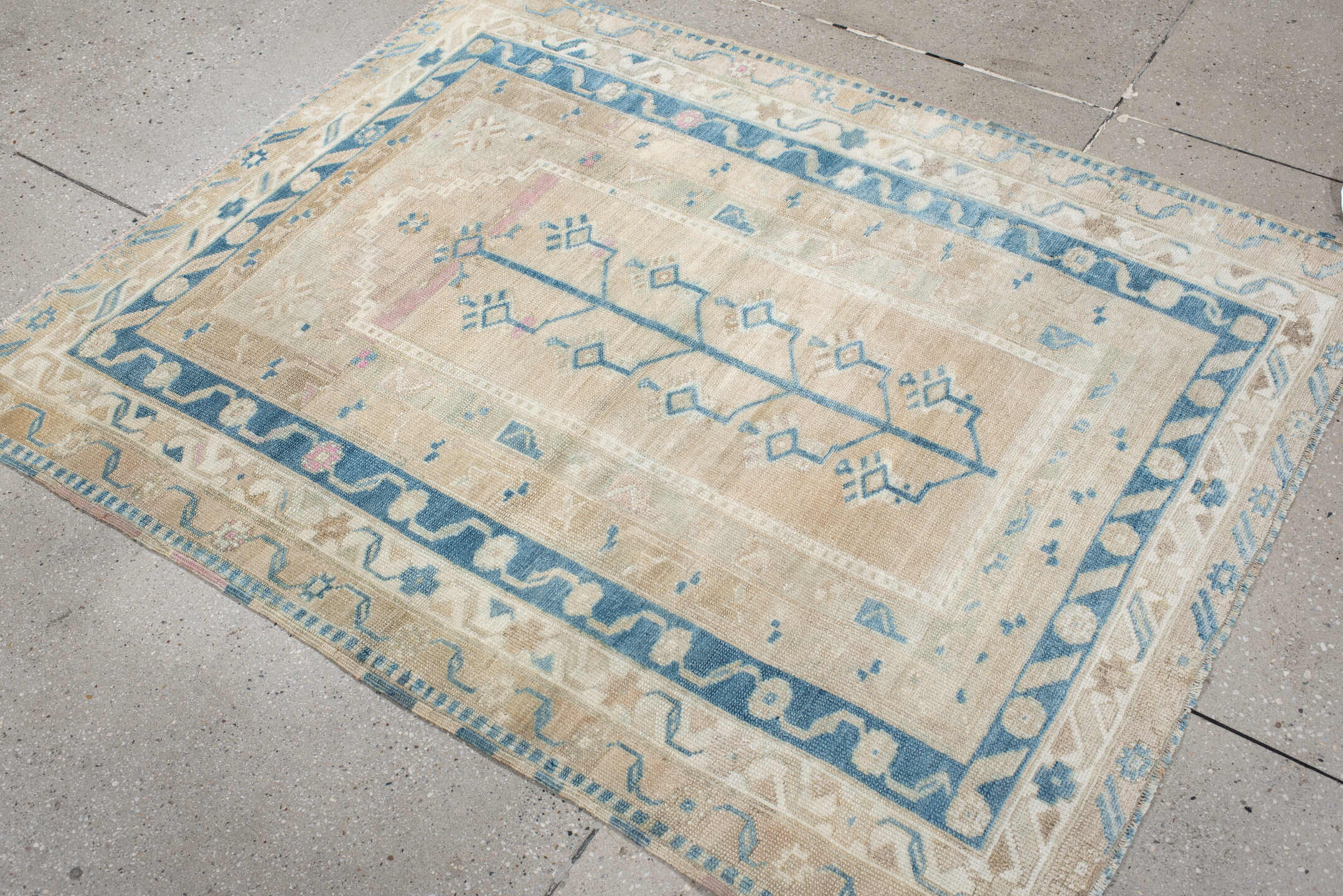 4' x 5' one-of-a-kind handmade vintage Anatolian small size rug. Color palette: ivory, sky_blue, beige, blush, taupe