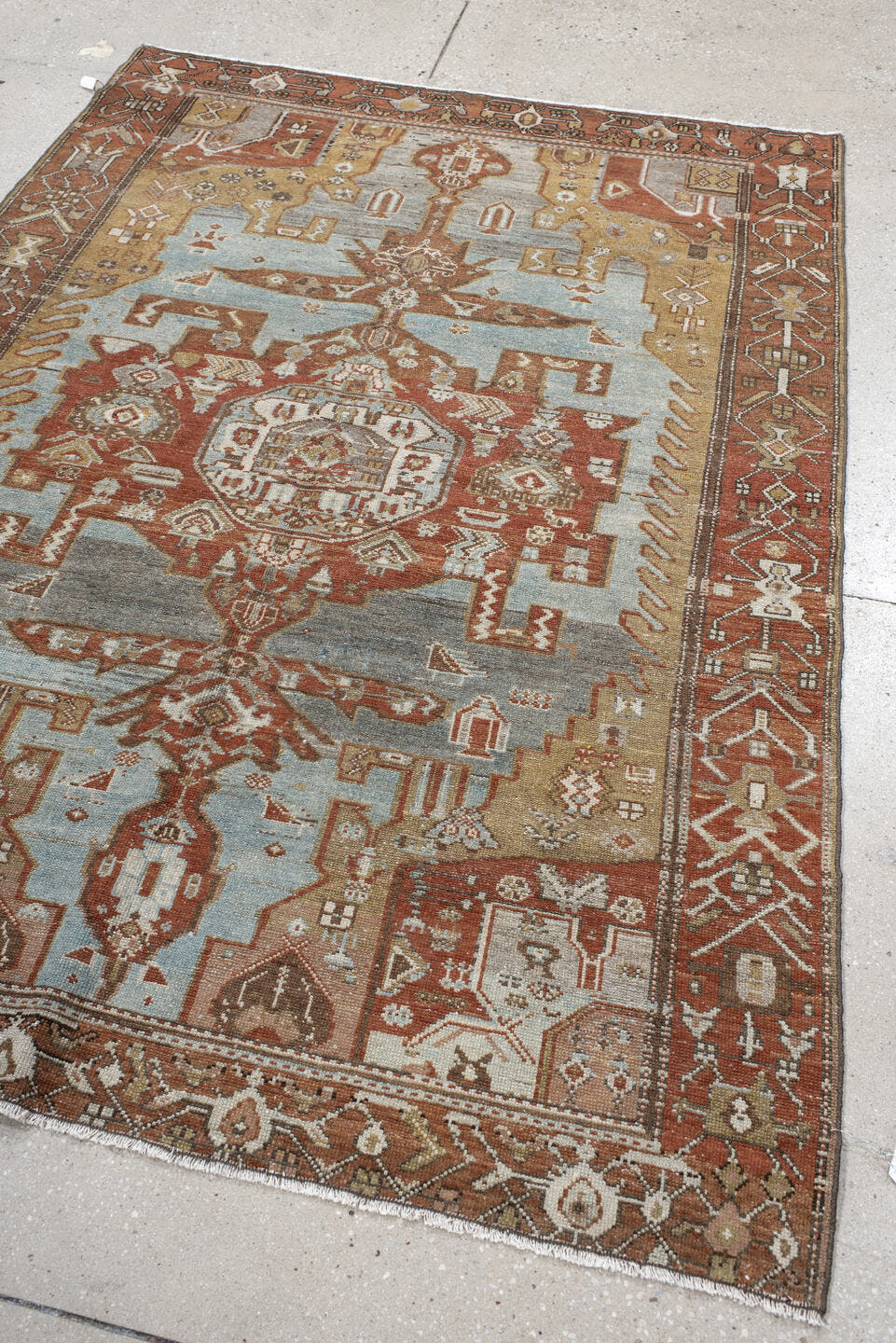 4' x 6' one-of-a-kind handmade vintage Malayer small size rug. Color palette: rust, sky blue, ivory, camel, terra cotta