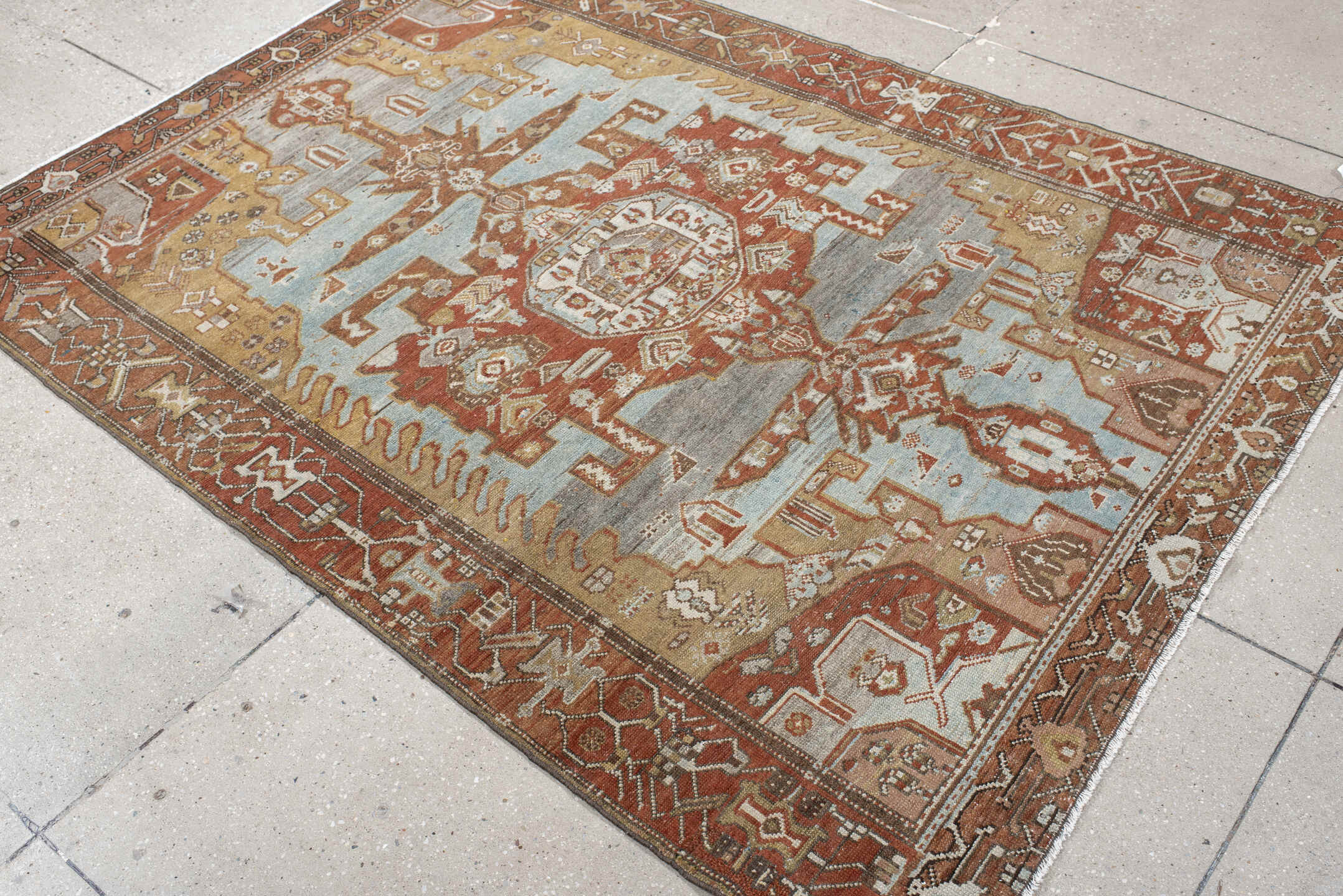 4' x 6' one-of-a-kind handmade vintage Malayer small size rug. Color palette: rust, sky blue, ivory, camel, terra cotta