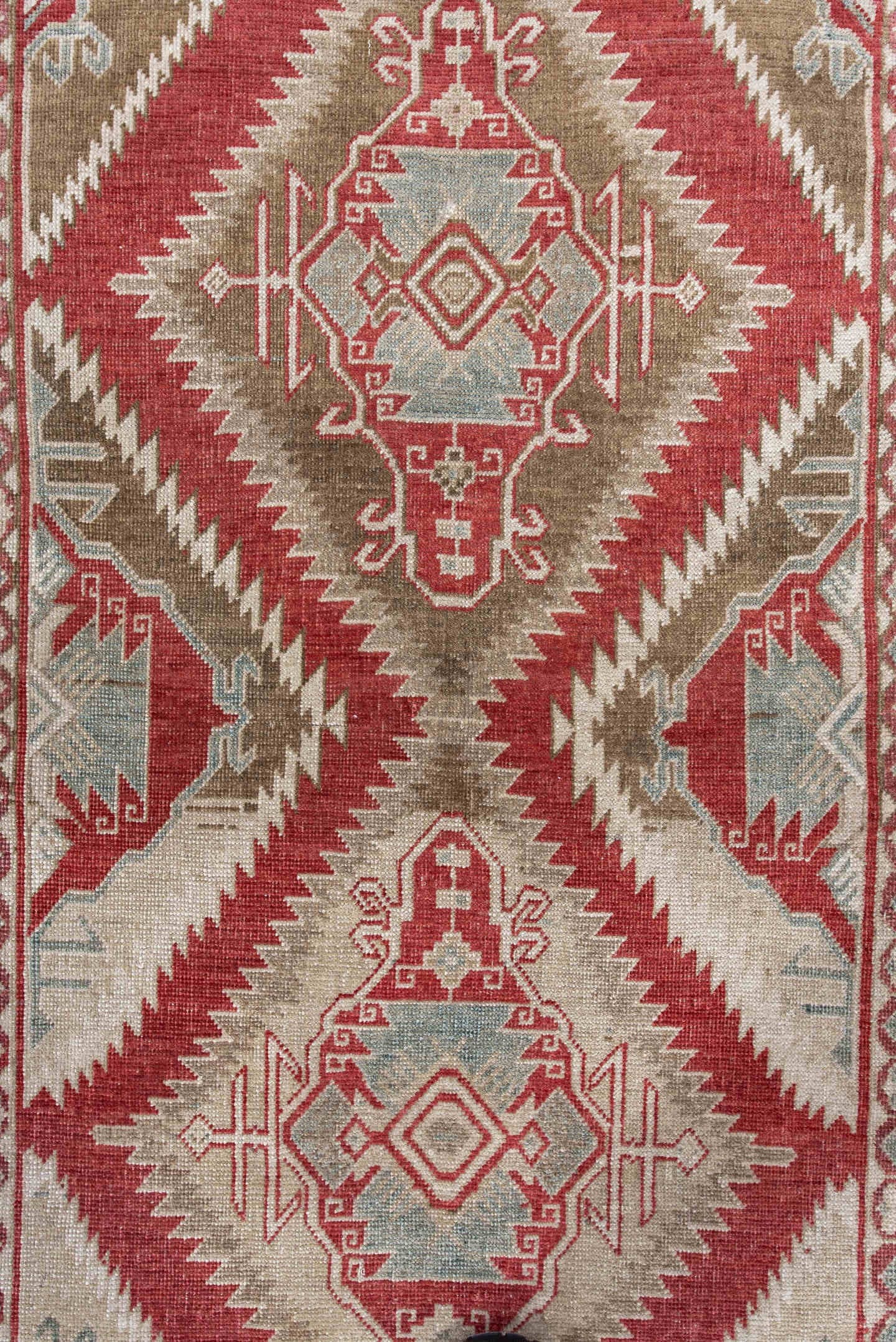 3' x 5' one-of-a-kind handmade antique Caucasian small size rug. Color palette: ivory, brick red, taupe, pale blue, camel