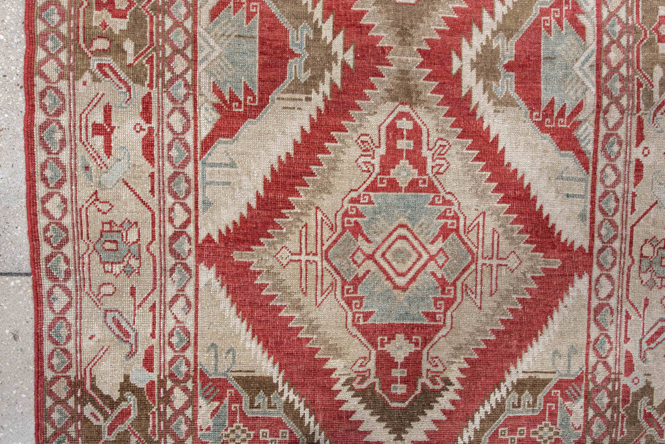 3' x 5' one-of-a-kind handmade antique Caucasian small size rug. Color palette: ivory, brick red, taupe, pale blue, camel