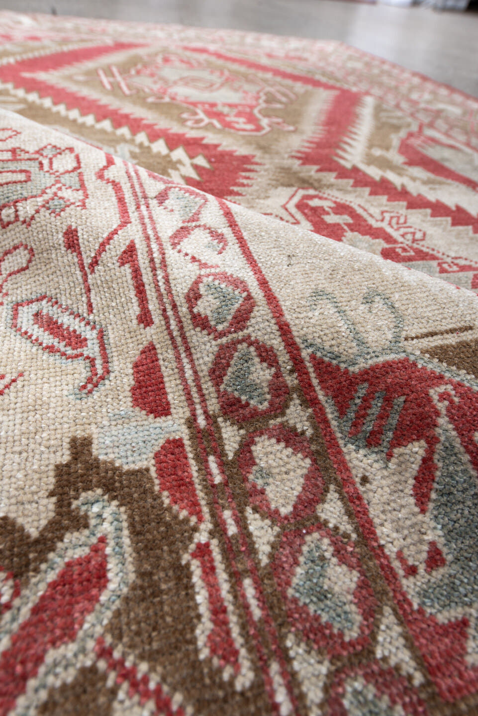 3' x 5' one-of-a-kind handmade antique Caucasian small size rug. Color palette: ivory, brick red, taupe, pale blue, camel