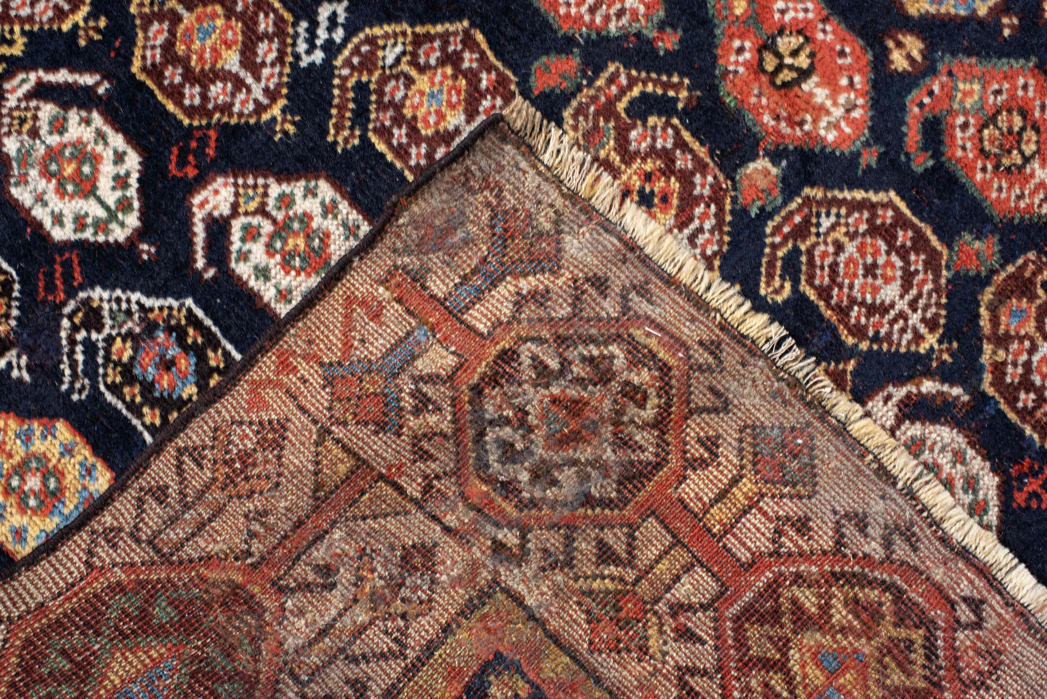 5' x 7' one-of-a-kind handmade vintage Qashqai rug. Color palette: ivory, charcoal, rust, crimson, indigo, camel, slate