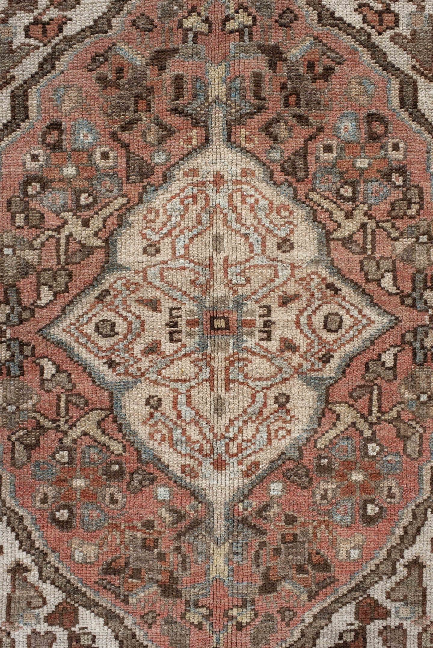 5' x 8' one-of-a-kind handmade antique Baktiary medium size rug. Color palette: ivory, dusty blue, rust, taupe, brown