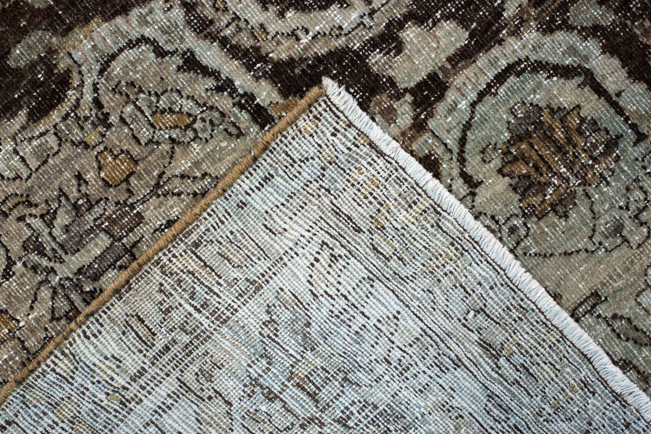 4' x 7' one-of-a-kind handmade vintage Baktiary rug. Color palette: ivory, charcoal, taupe, slate, camel, brown, beige, gray