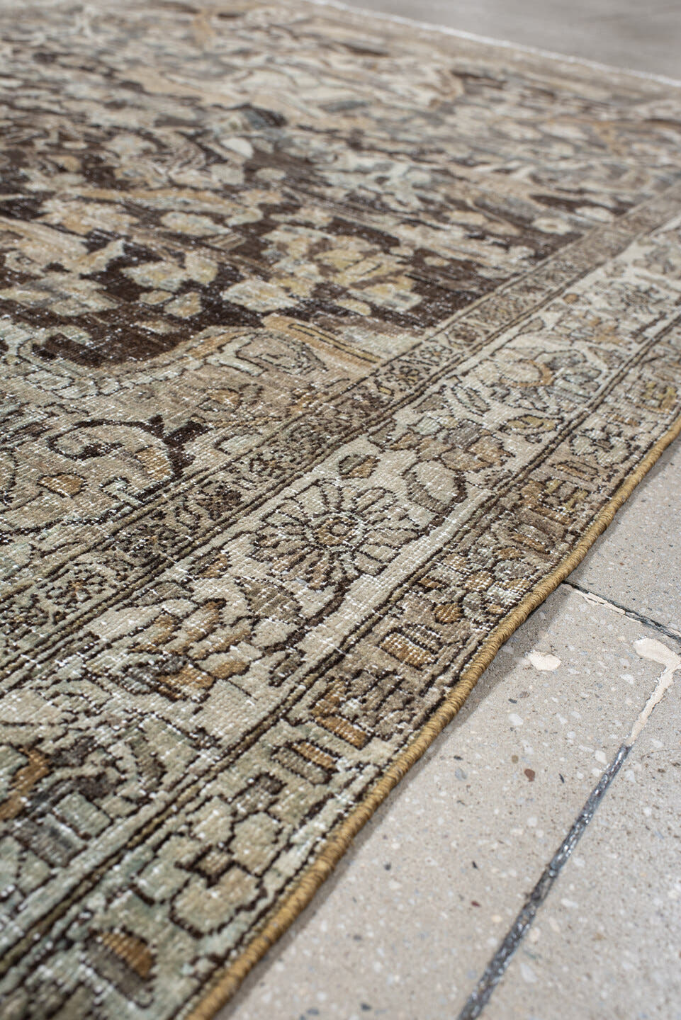 4' x 7' one-of-a-kind handmade vintage Baktiary rug. Color palette: ivory, charcoal, taupe, slate, camel, brown, beige, gray