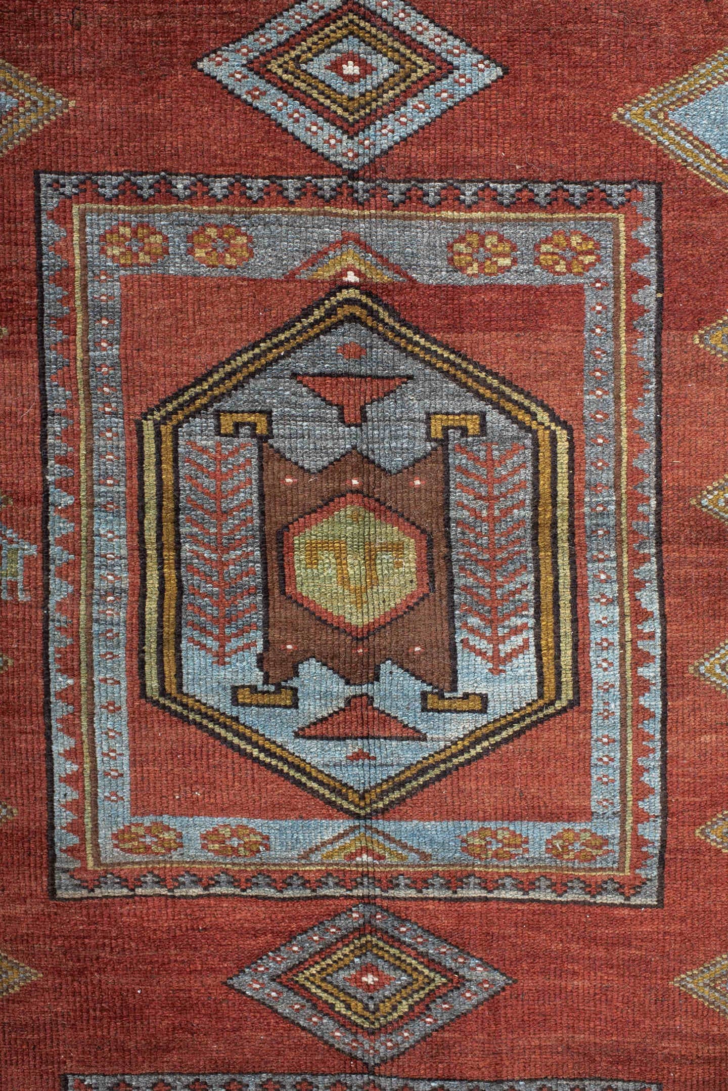 5' x 10' one-of-a-kind handmade antique NW Persian medium size rug. Color palette: rust, ivory, sky blue, camel, charcoal