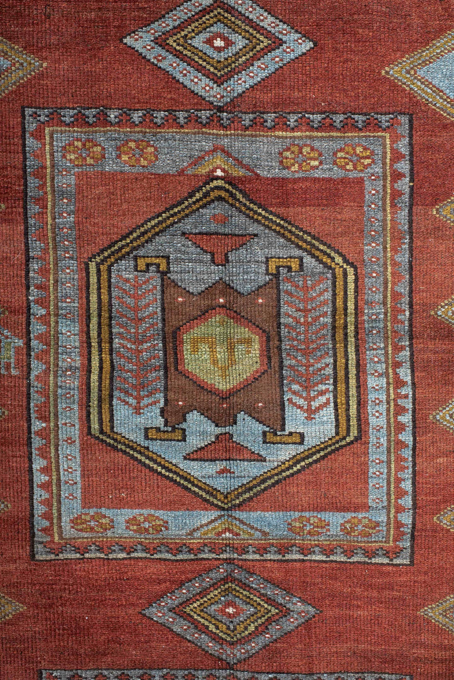 5' x 10' one-of-a-kind handmade antique NW Persian medium size rug. Color palette: rust, ivory, sky blue, camel, charcoal
