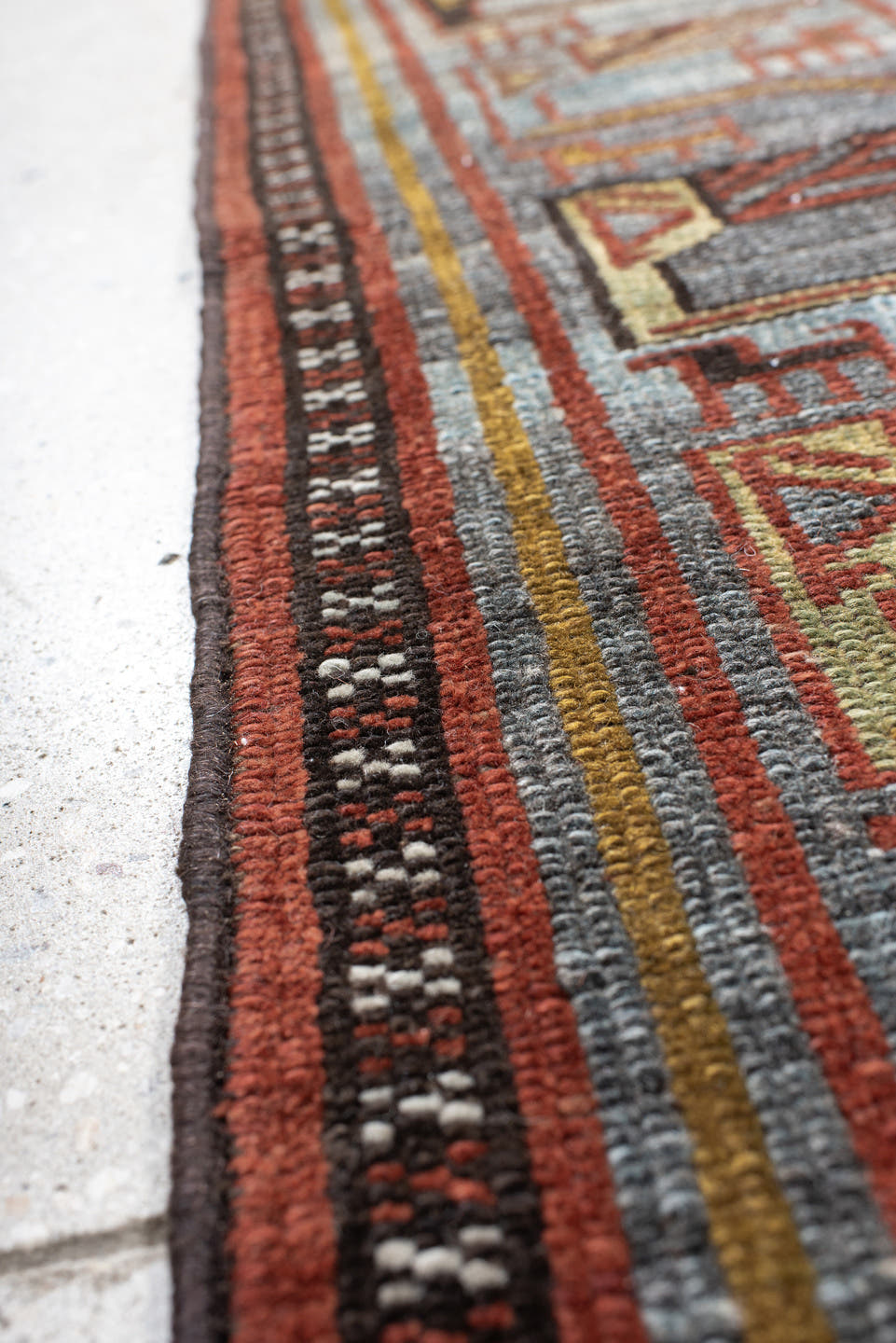5' x 10' one-of-a-kind handmade antique NW Persian medium size rug. Color palette: rust, ivory, sky blue, camel, charcoal