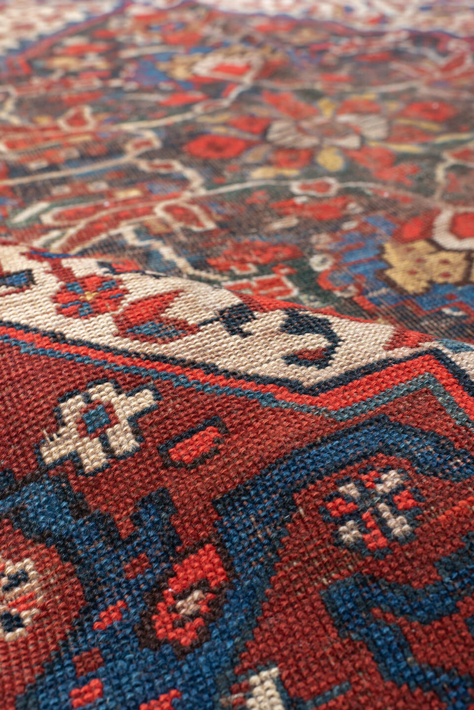 4' x 6' one-of-a-kind handmade vintage  small size rug. Color palette: ivory, red, navy, cobalt, rust, camel, brown, blue