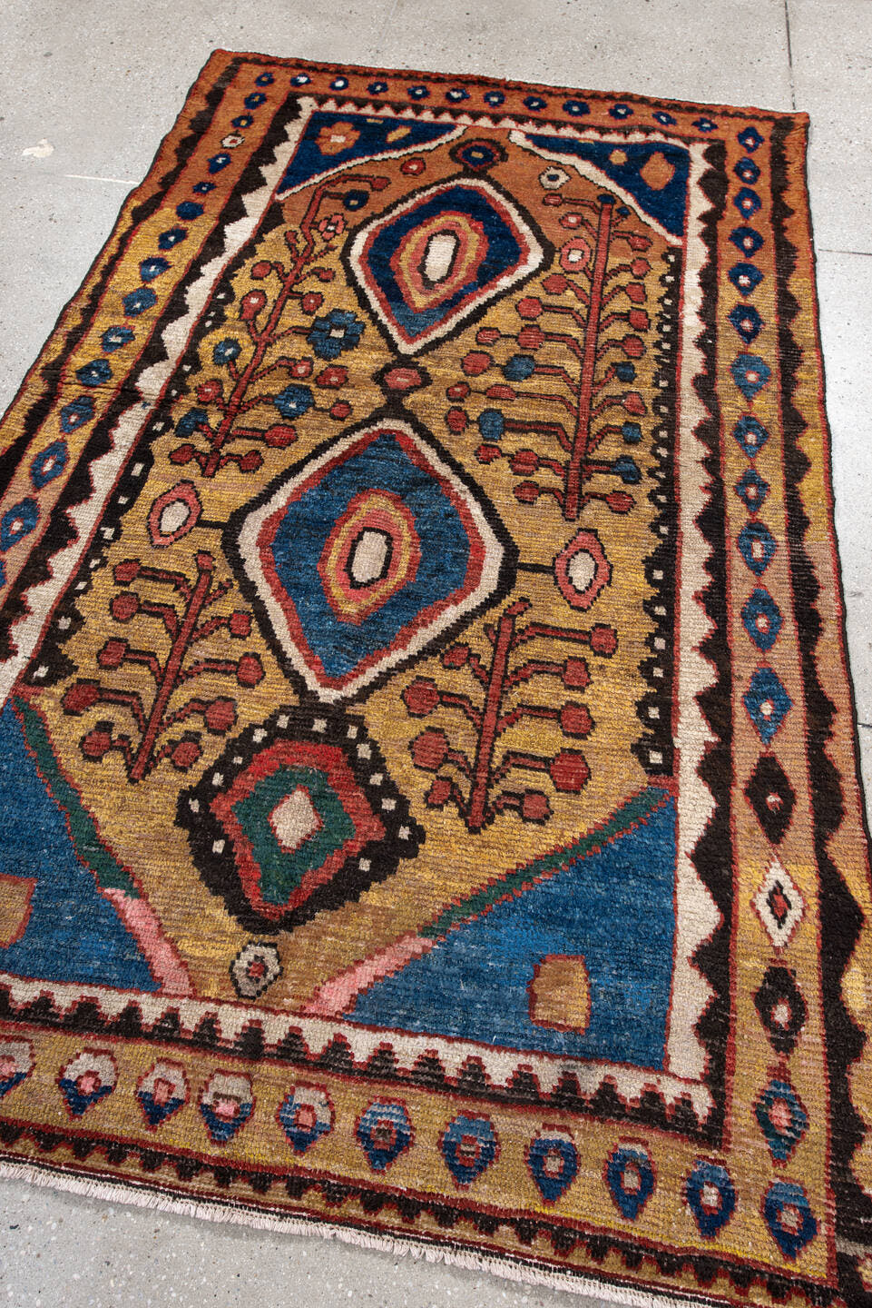 4' x 6' one-of-a-kind handmade antique Gabbe small size rug. Color palette: gold, blue, rust, ivory, brown, rose, teal
