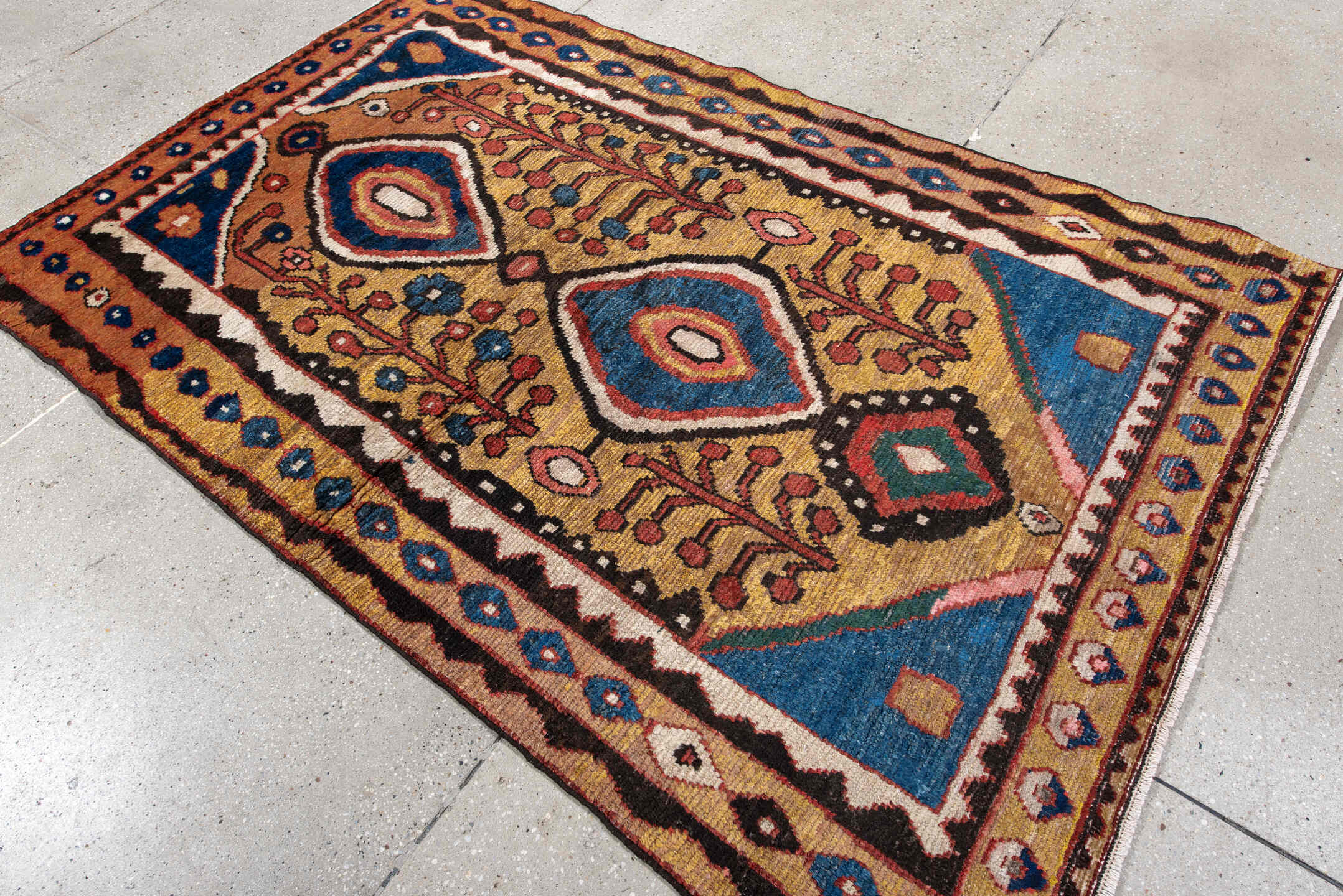 4' x 6' one-of-a-kind handmade antique Gabbe small size rug. Color palette: gold, blue, rust, ivory, brown, rose, teal