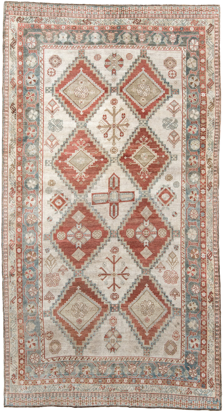 5' x 10' one-of-a-kind handmade vintage Shiraz medium size rug. Color palette: ivory, terra cotta, sky blue, rust, beige